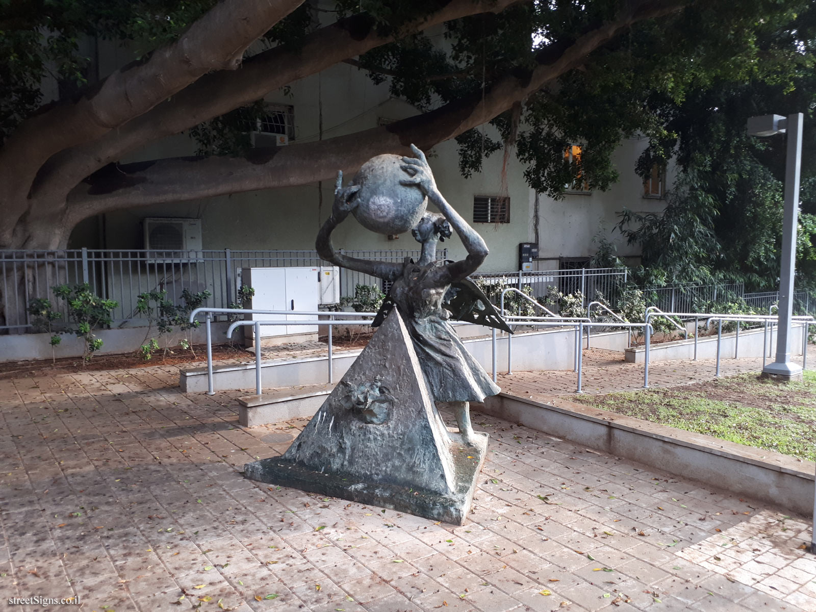 "Woman with Sphere and Pyramid" - Outdoor sculpture by Bernard Reder - Mandelstamm St 5, Tel Aviv-Yafo, Israel