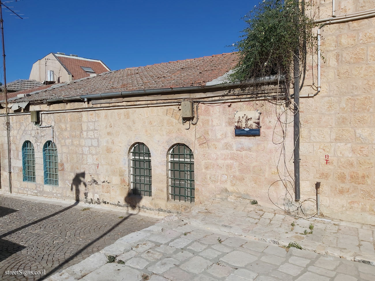 Jerusalem - Photograph in stone - The Family of Yosef and Miriam Navon - HaGilboa St 11, Jerusalem, Israel