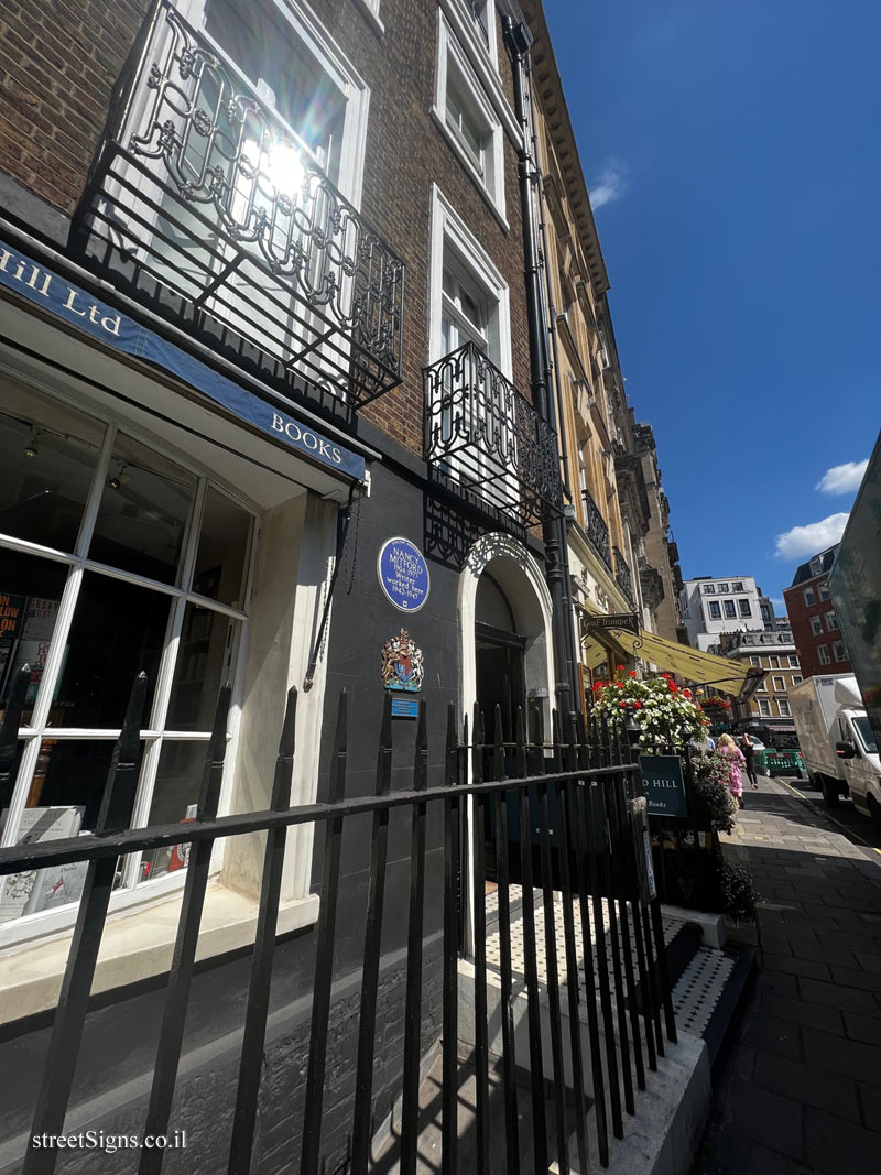 London - Commemorative plaque at the place where the writer Nancy Mitford worked - 10 Curzon St, London W1J 5HH, UK