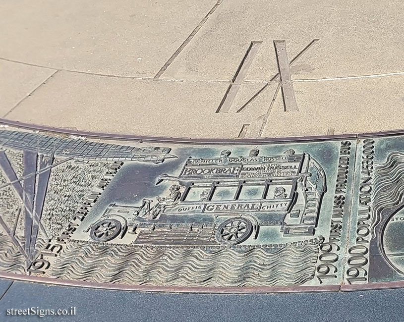 London - Sundial at Tower Hill Station - First Mass Produced Bus