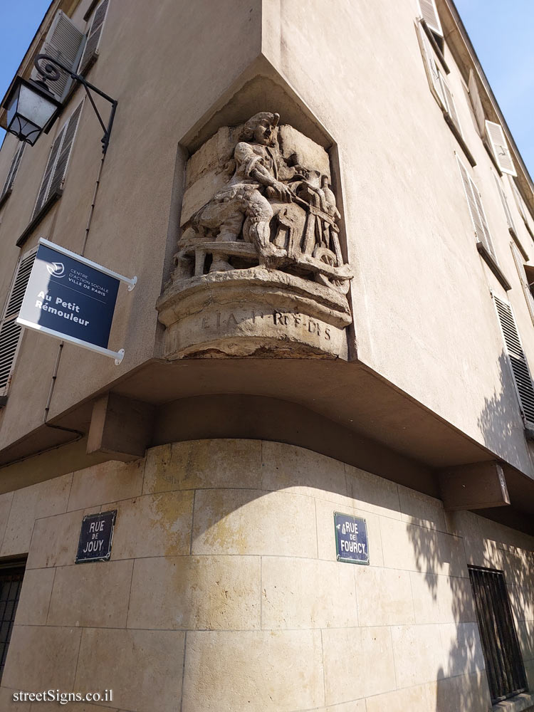 Paris - A relief of a knife sharpener on a street corner - 2 Rue de Jouy, 75004 Paris, France