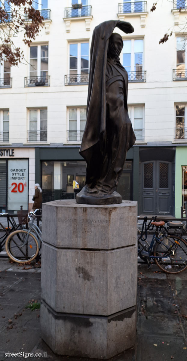 Paris - "The Man with the Raised Arm" outdoor sculpture by Olivier Bryce - 48 Rue du Caire, 75002 Paris, France