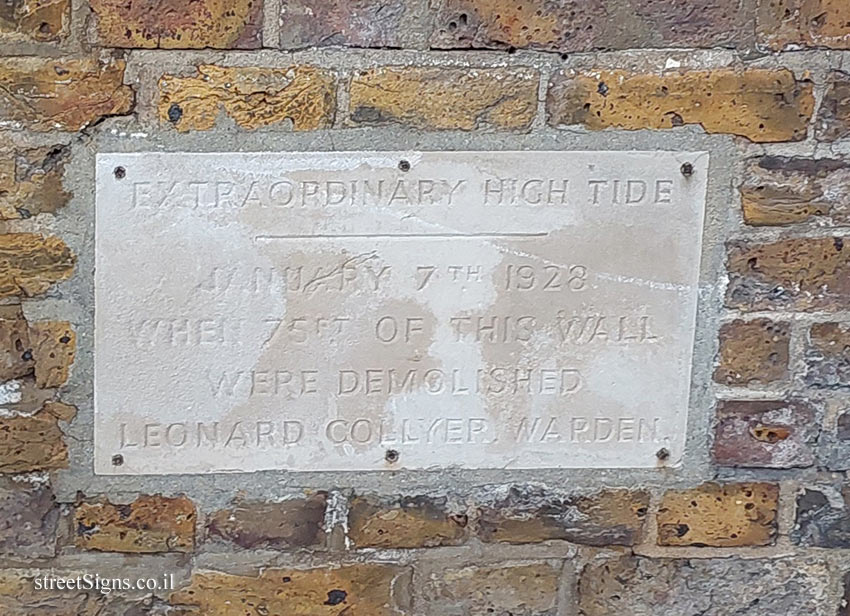 London - Greenwich - Signs on a wall on the bank of the Thames indicating the tide levels - 18 Highbridge Wharf, London SE10 9PS, UK