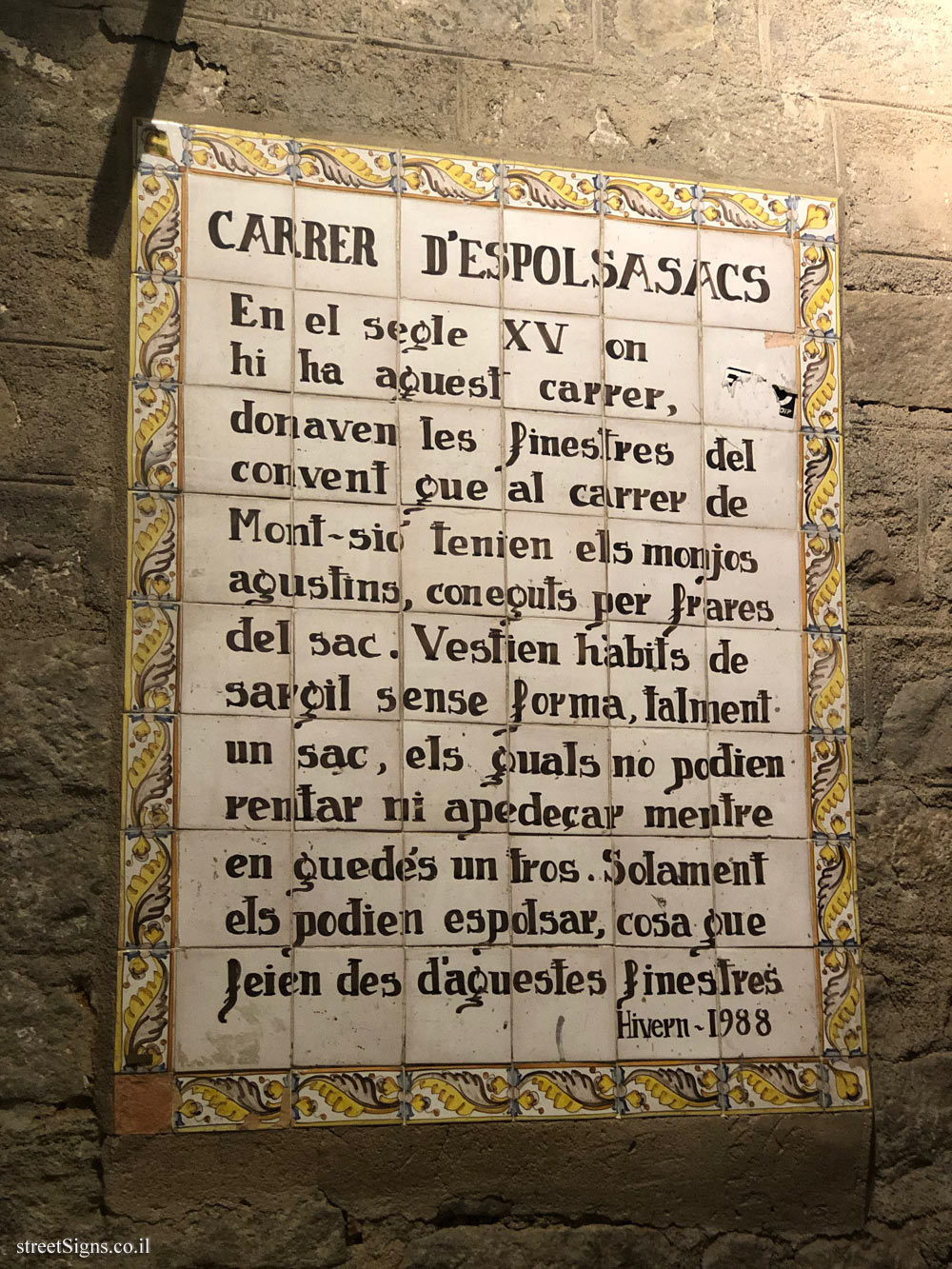 Barcelona - A sign with an anecdote on Espolsa-sacs Street