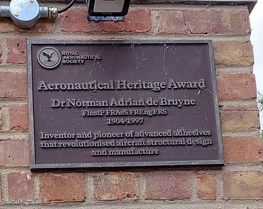 Cambridge - A memorial plaque to Norman de Bruyne at the entrance to the Faculty of Engineering