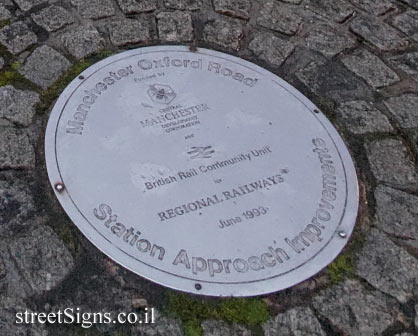 Manchester - A plaque indicating the station approach works on Oxford road railway station