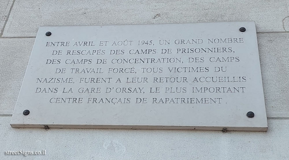 Paris-A plaque indicating that the d’Orsay train station was a refuge place for Nazi prisoners