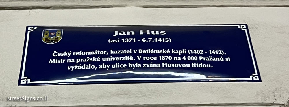 Prague - sign on the street named after Jan Hus
