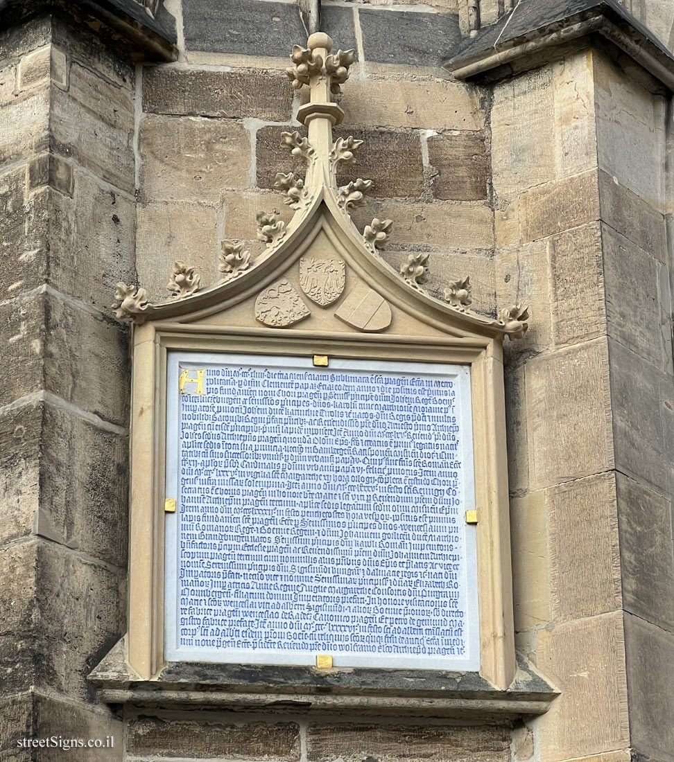 Prague - Latin text on the wall of the south tower of St. Vitus Cathedral
