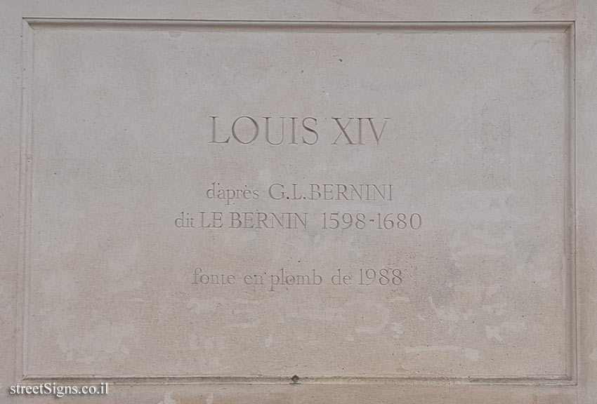 Paris - The statue of Louis XIV in the courtyard of the Louvre Museum